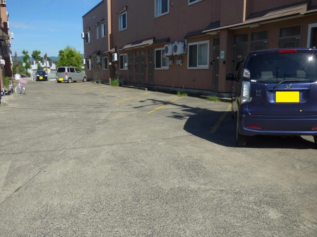 ベルメゾン B107号室 駐車場